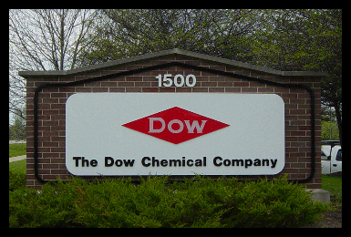 aluminum sign with illuminated push through plastic letters and logo shown during the day.