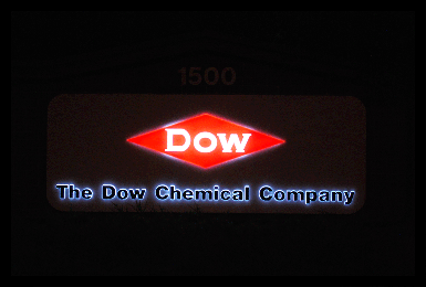 aluminum sign with illuminated push through plastic letters and logo shown at night