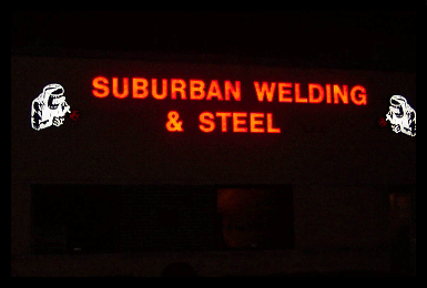 led illuminated channel letters and logos at night